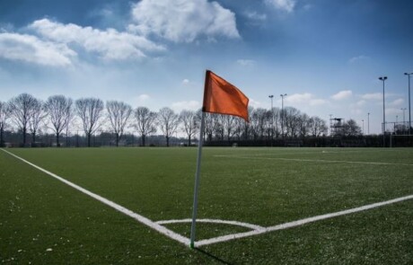 A photo of a corner of an outdoor soccer pitch
